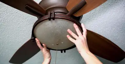 Ceiling fan repair and reinstallation on ceiling mount in Las Vegas, NV