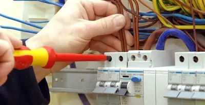 electrician services performing professional electrical panel wiring and connections in Las Vegas, NV
