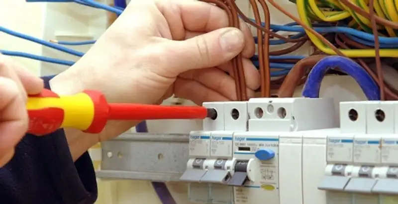electrician services performing professional electrical panel wiring and connections in Las Vegas, NV