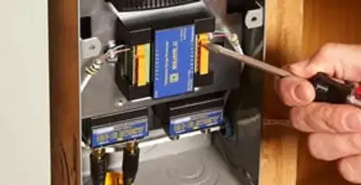 Whole home surge protection device being installed by a licensed electrician to protect electrical systems in Las Vegas, NV